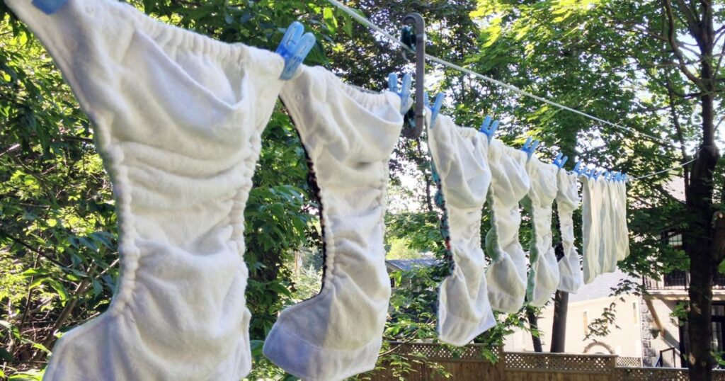 keep-cloth-diapers-white-baby-cloth-diapers-hanging-on-the-washing-line-to-sun-dry