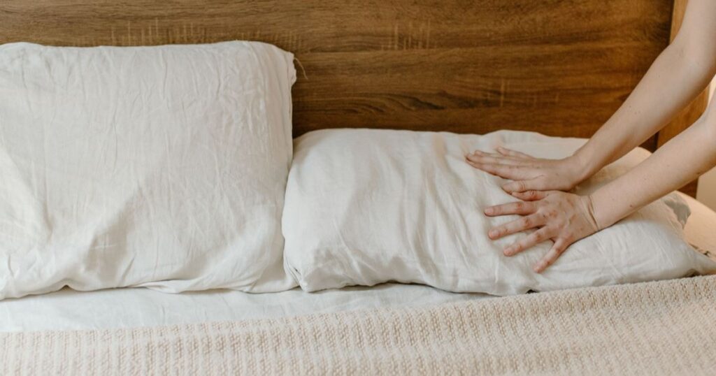 A homebirth doula preparing bedding