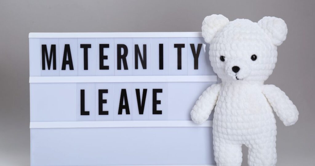 maternity-leave-laws-in-north-carolina-lightbox-sign-reading-Maternity-Leave-next-to-a-white-stuffed-teddy-bear