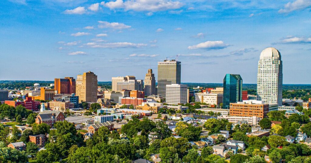 landscape view of winston salem in north carolina with trees and buildings in view
