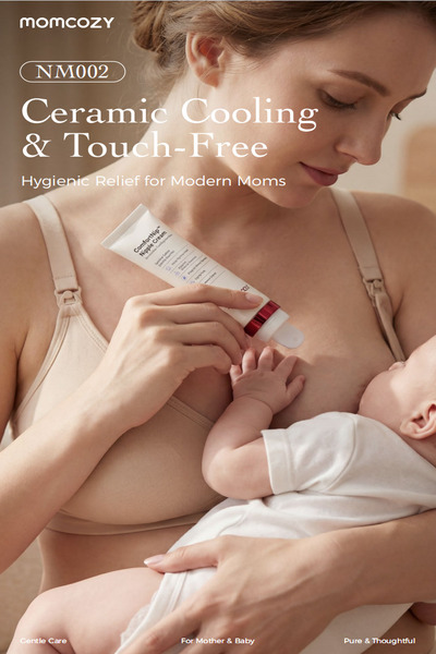 Photo of mother holding and breastfeeding her baby showcasing the Momcozy ComfortNip Nipple Cream