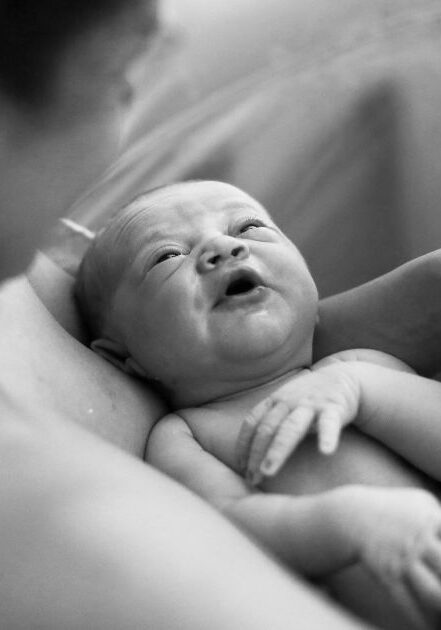 mom-holding-baby-after-birth